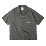 Dark grey short-sleeve button-up shirt by Love More Club with light blue 